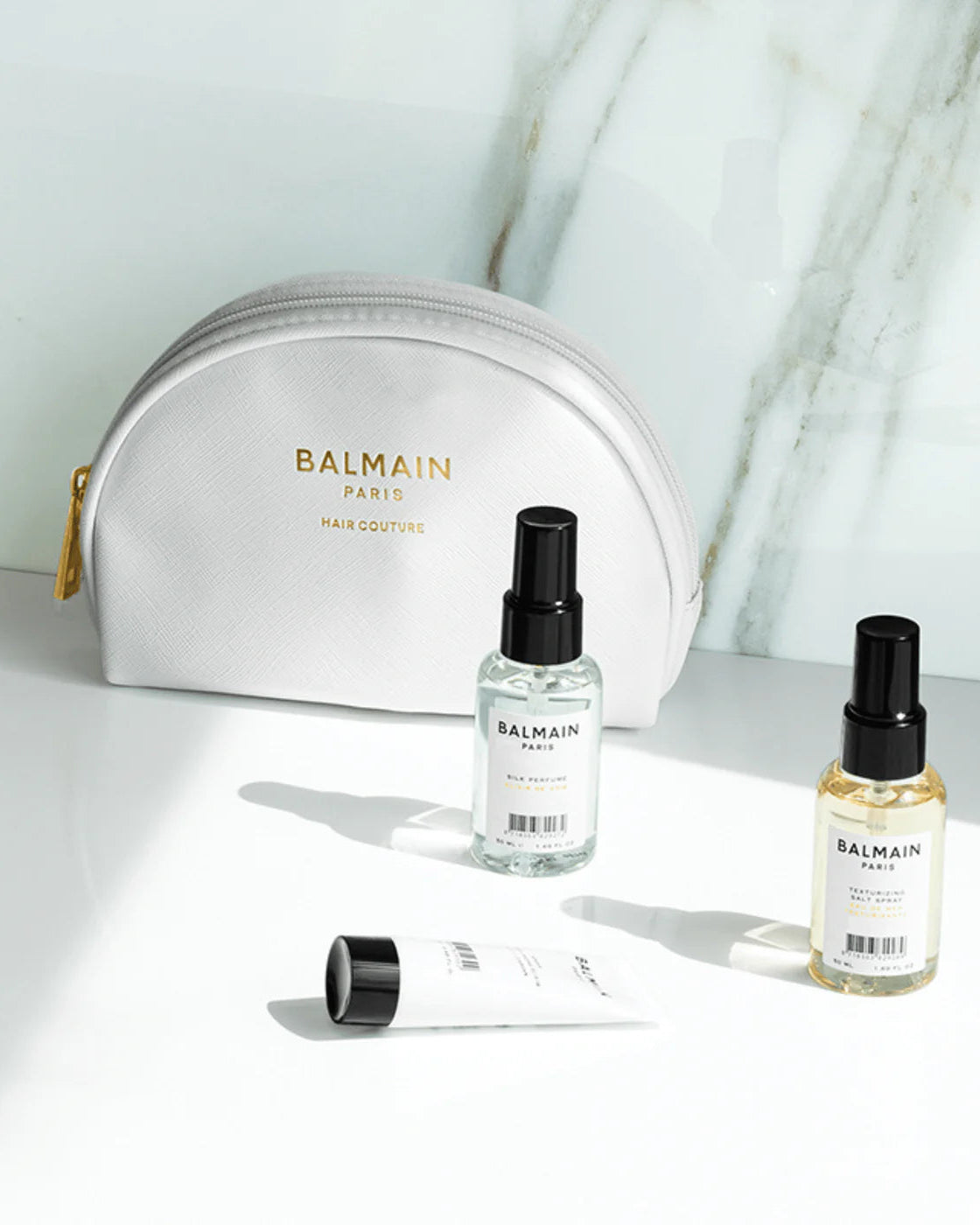 Cosmetic bag with styling products